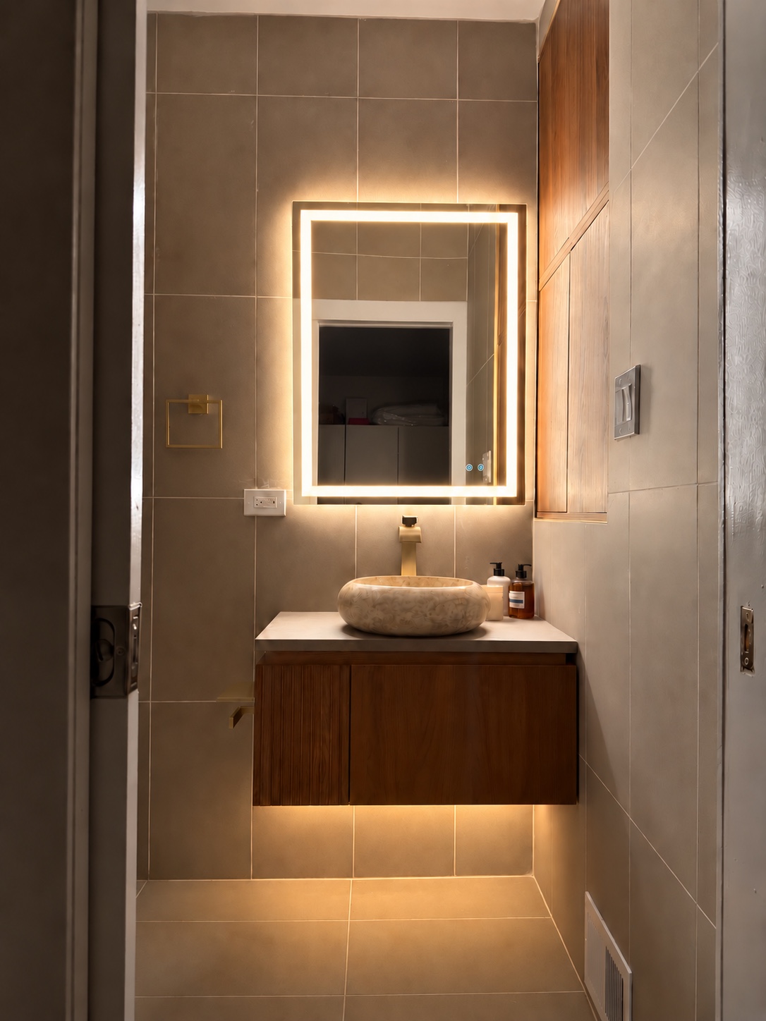 Small room, strong finish — Tailored Powder Room by Alpha Handyworks