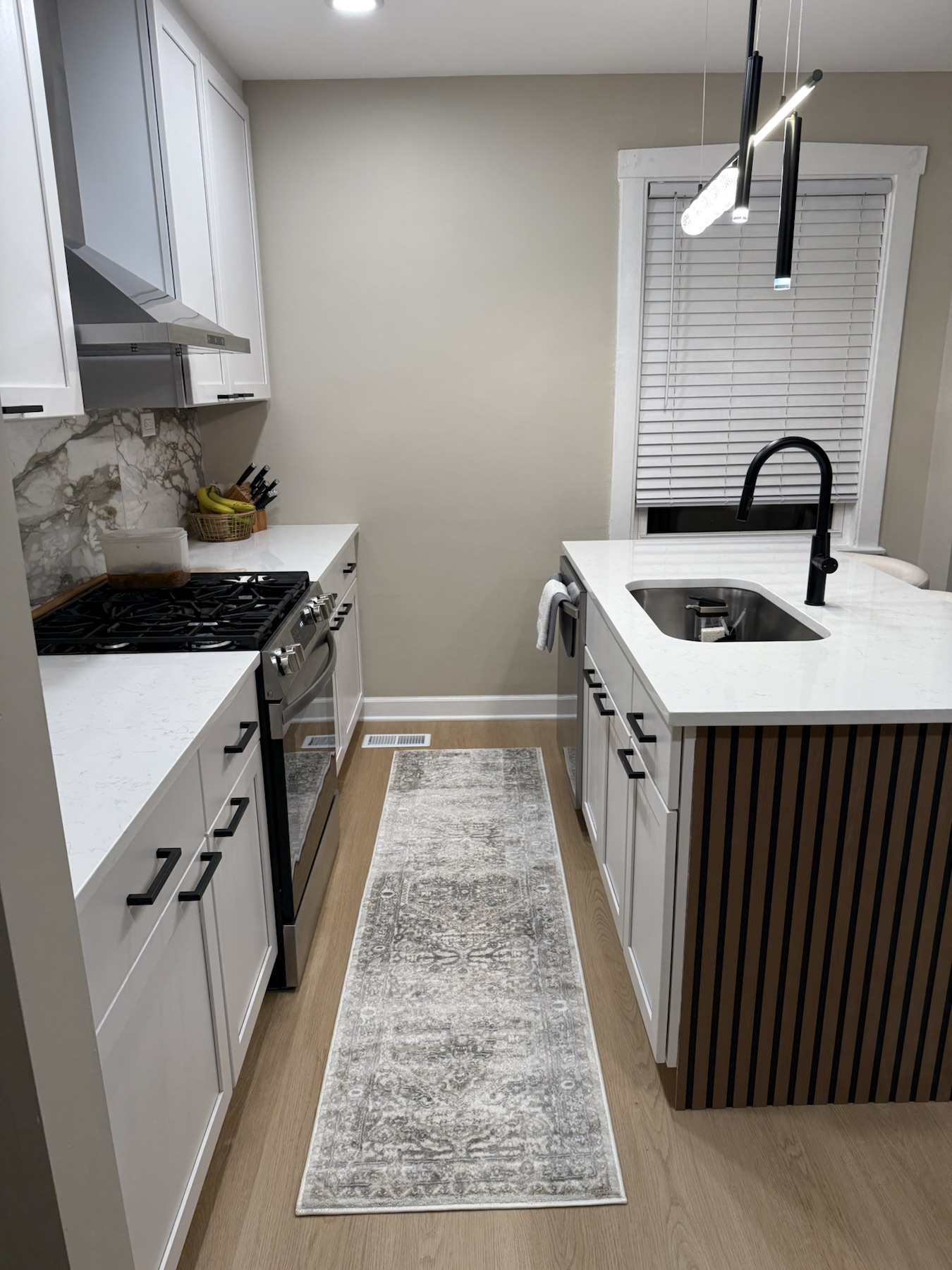 Built for gathering — Statement Island Kitchen by Alpha Handyworks